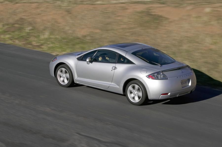  Mitsubishi Eclipse 2009 года  (фото 33 из 205)